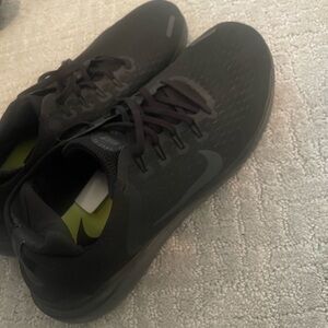 Black Nike running shoes